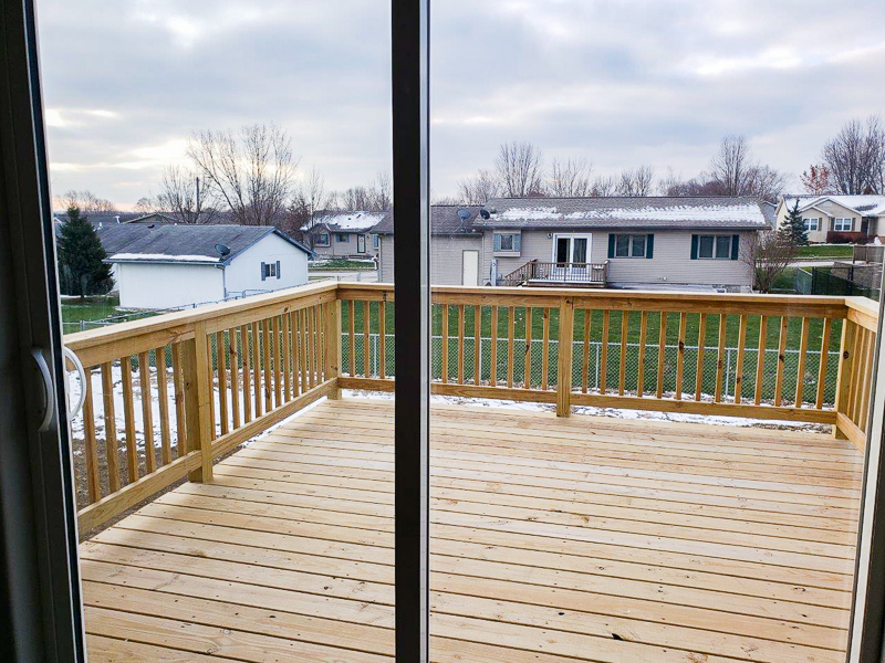 Apex Construction Iowa City IA New Home 110 Cherry Lane Riverside Iowa backyard deck