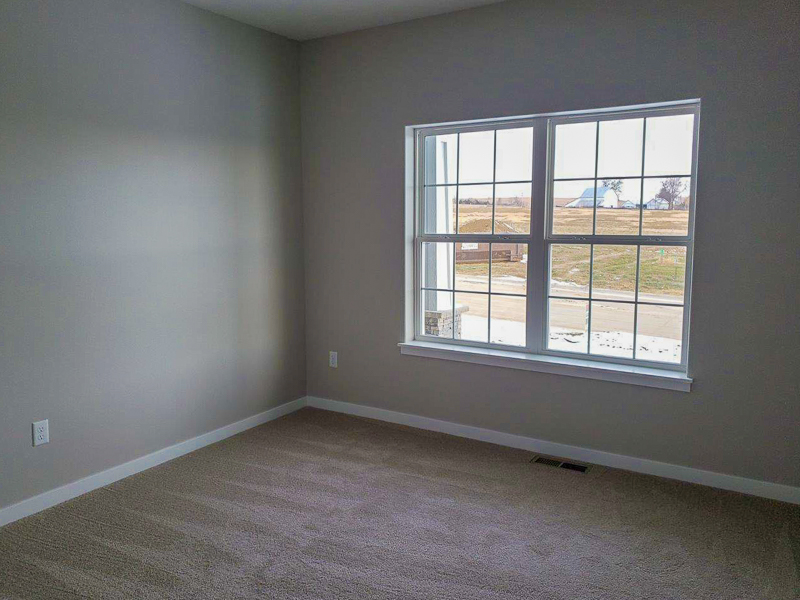 Apex Construction Iowa City IA New Home 110 Cherry Lane Riverside Iowa living bedroom